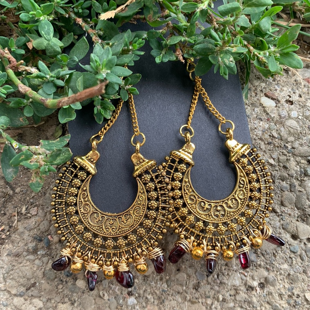 Boho style earrings accented with Garnet stone.